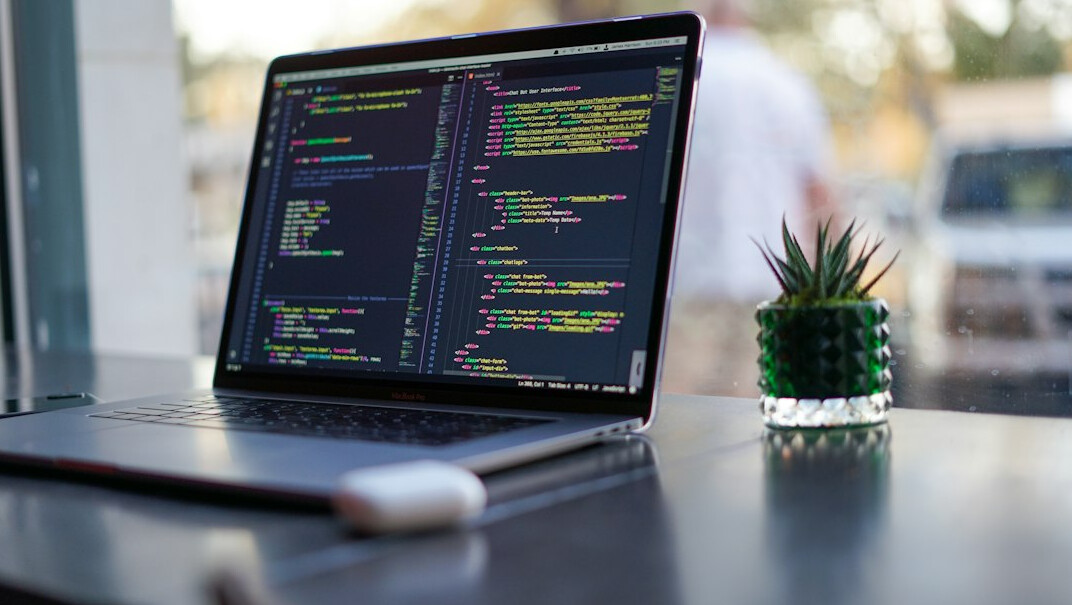programmer coding insurance software